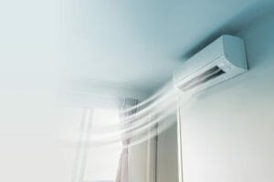 Air conditioner cooling room with visible air flow.